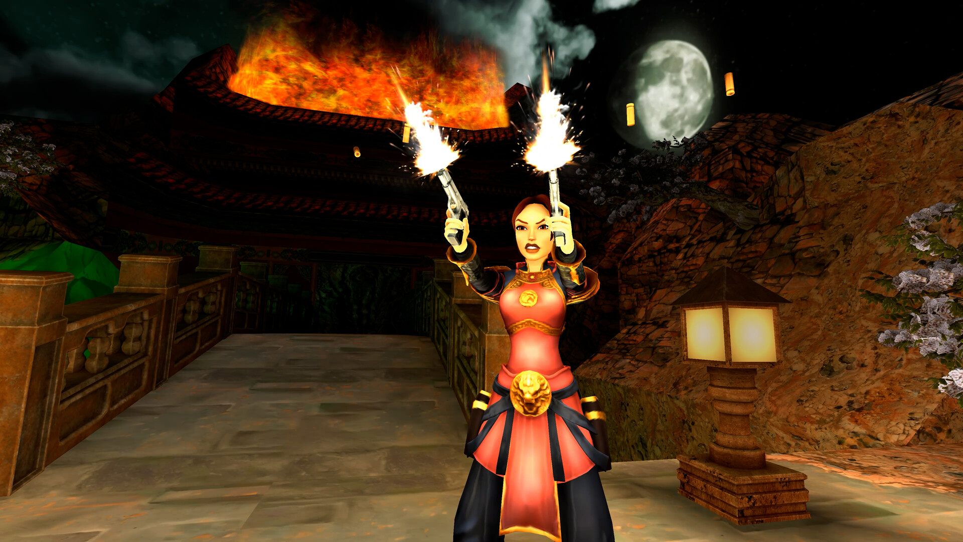Tomb Raider remastered screenshot of Lara Croft firing dual pistols in a night-time temple area